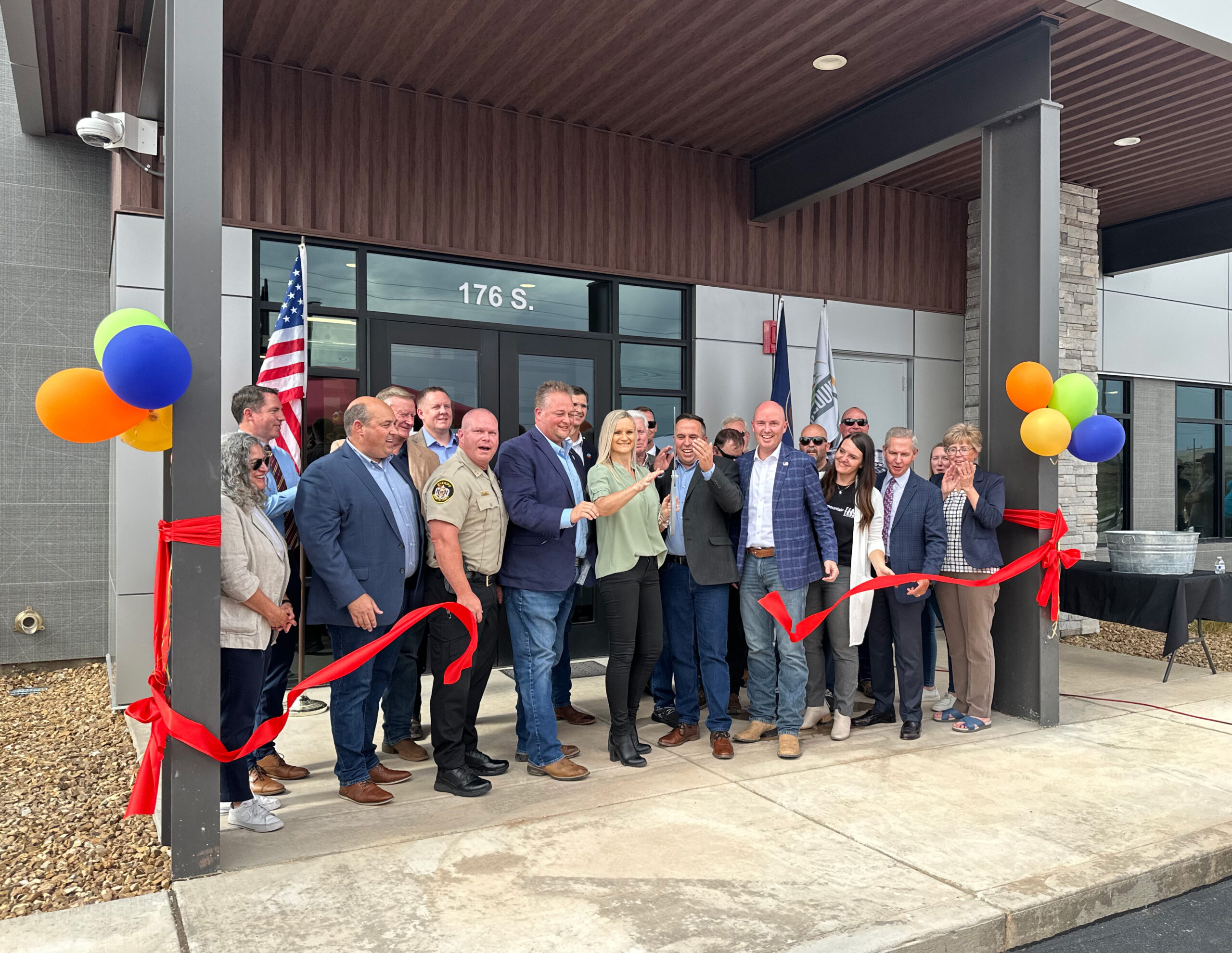 Group involved in the project cut the ribbon in front of the building.