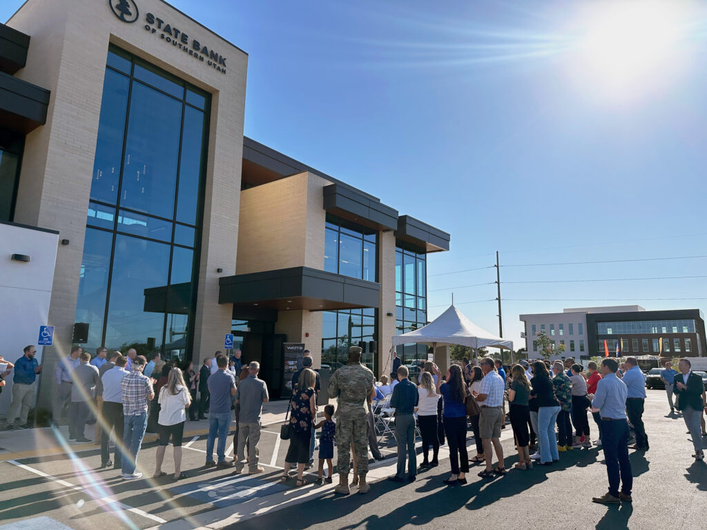 Crowd gathered outside building for ceremony